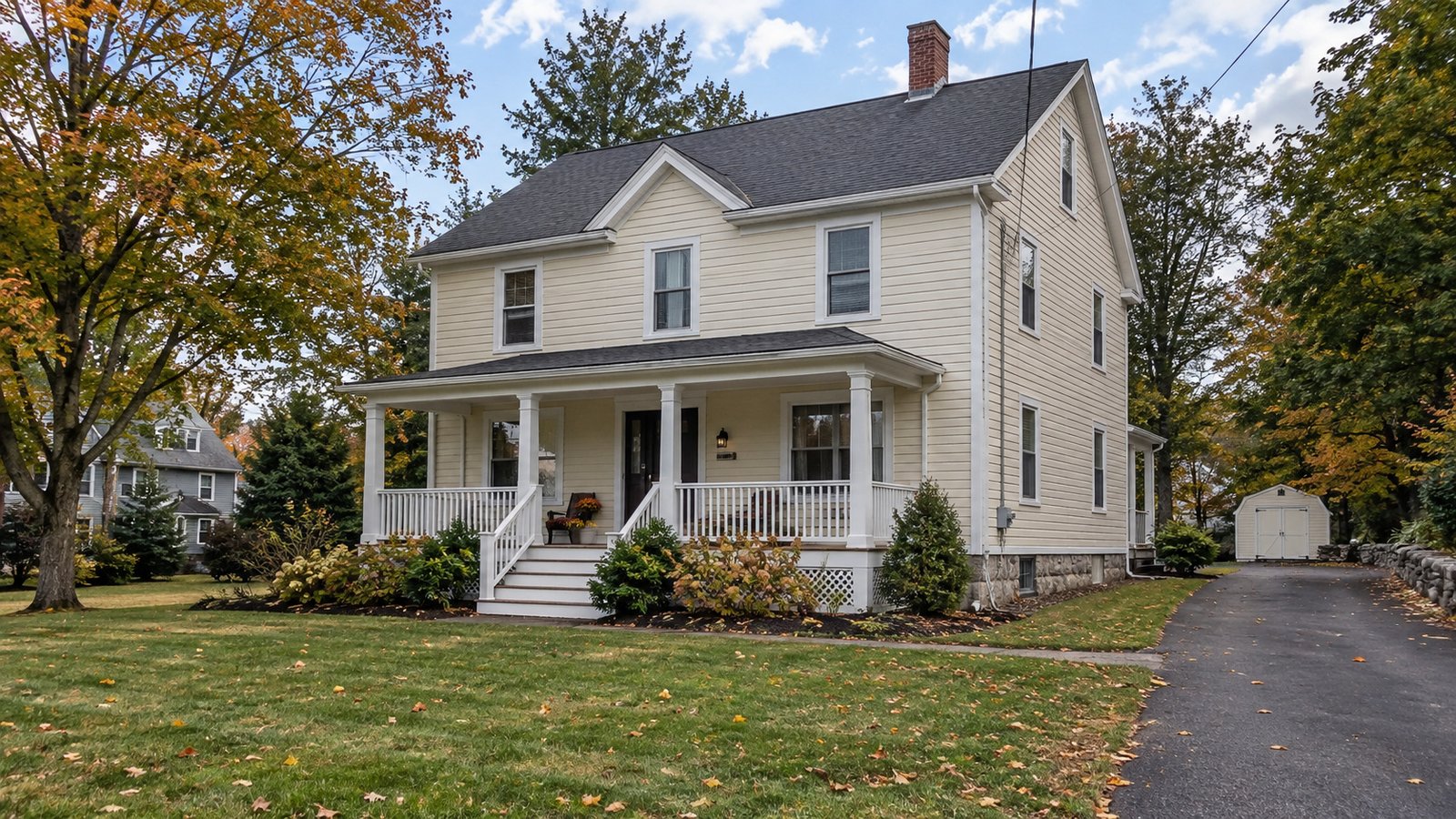Plan the receiving home A whole cream clapboard two-story house with a covered porch, granite foundation and side driveway.