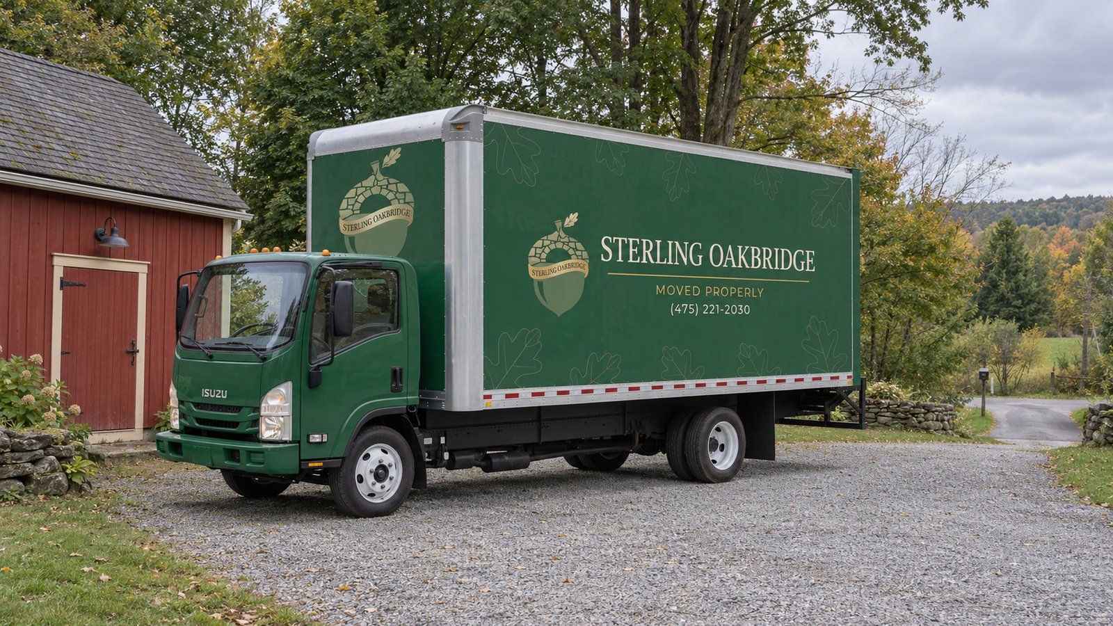 Resolve standing and departure space A complete green Sterling Oakbridge Isuzu moving truck standing in a private gravel court.