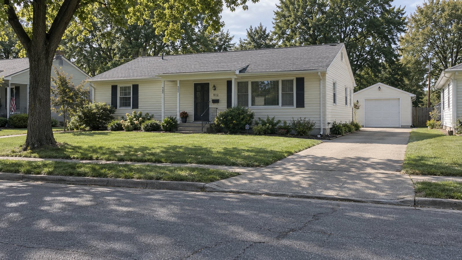 Assess the outside approach A complete cream ranch house with porch, garage and private concrete approach.