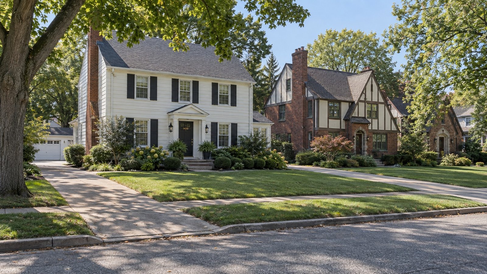 Check the home and outside approach Two colonial and Tudor-style homes with trees, front entries and driveway connections.