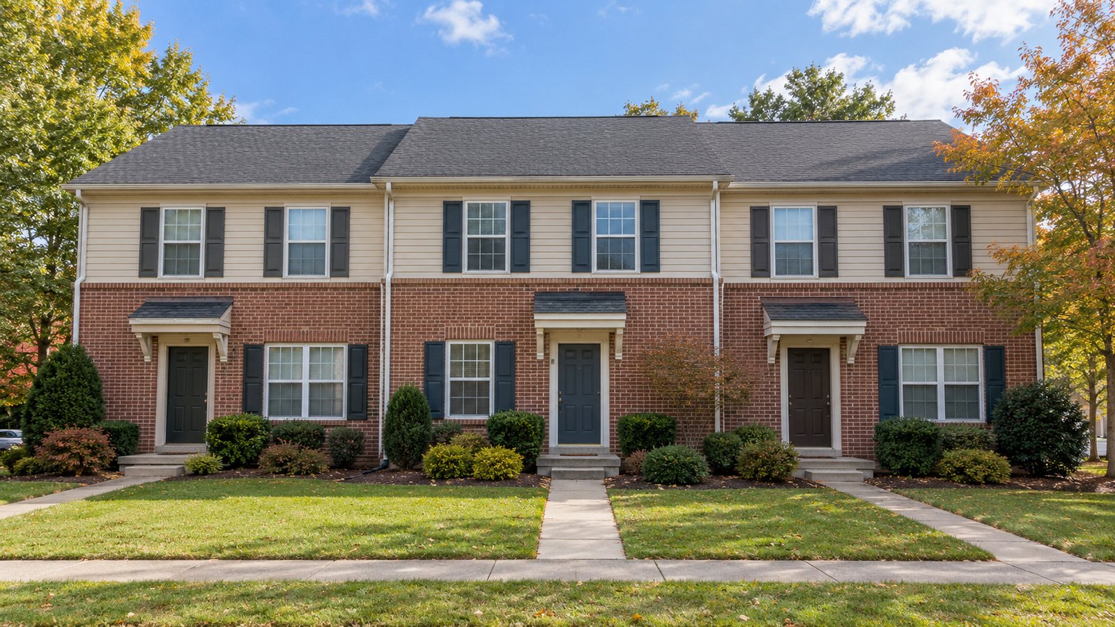 An attached-home address comparison Three representative attached homes with complete roofs, front doors and paths