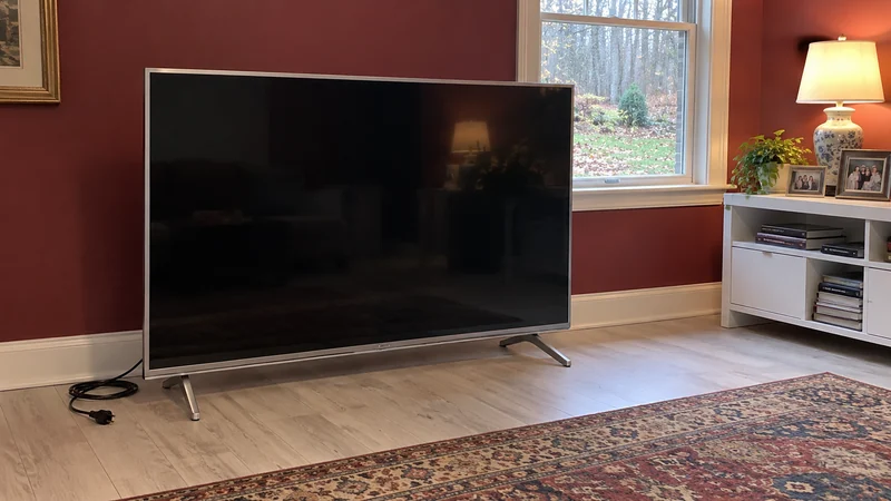An unplugged television stands in the private media room An older large television with its unplugged cord reviewed in a private Poughkeepsie media room