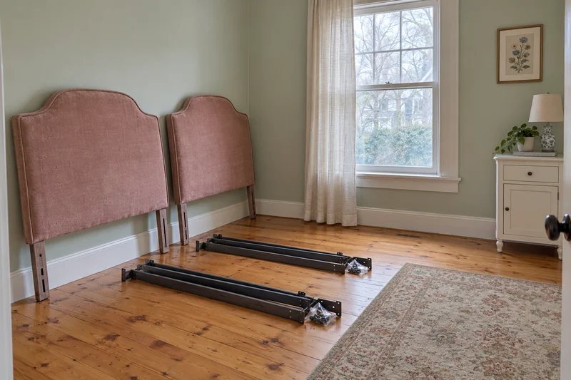 Two surplus twin headboards and disconnected bed-frame rails reviewed before local downsizing in Rumson Two surplus twin headboards and disconnected bed-frame rails reviewed before local downsizing in Rumson